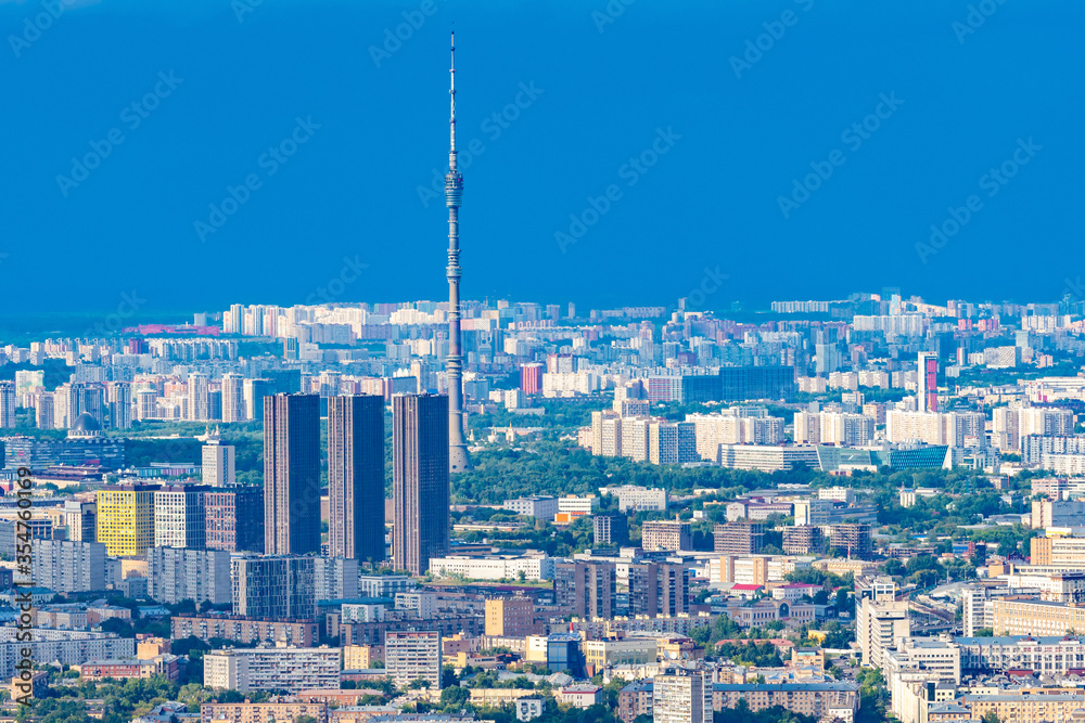 Cities of Russia. Panorama of Moscow from a height. The capital of Russia on a summer day. TV tower, residential buildings and office buildings. Urban landscape. Travel to Russia.