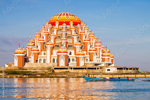 Bild auf Leinwand Masjid 99 Kubah (99 Domes Mosque), a beautiful Mosque with unique architecture, located in famous destination, Losari Beach, Makassar, South Sulawesi, Indonesia