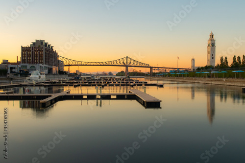 Bilde på lerret Long exposure photography of Montreal's old port at sunset