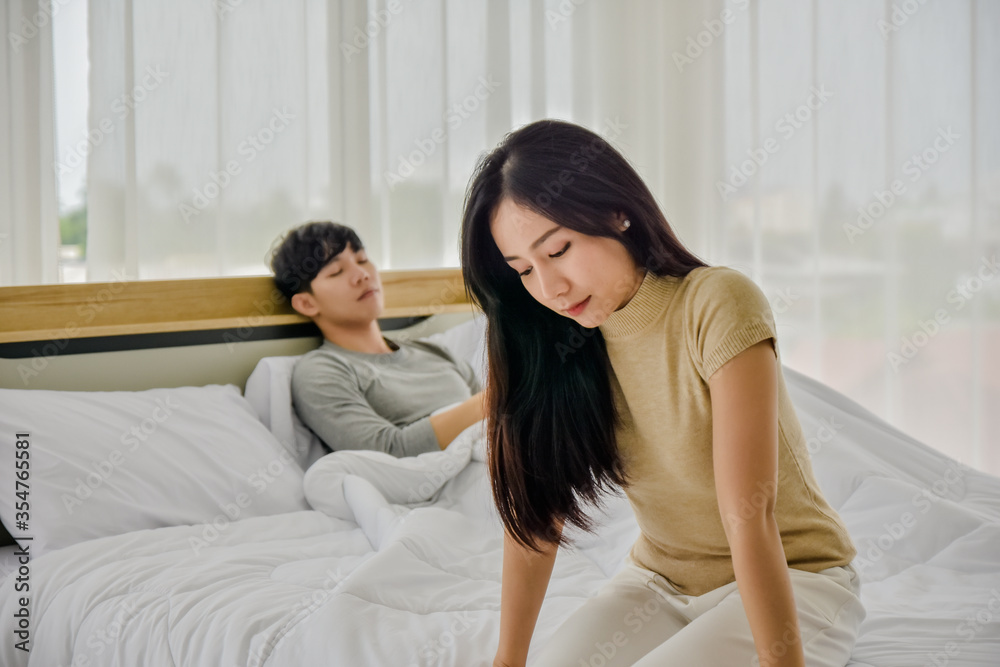 Man women living on bed room social distancing,Husband wife problem relationship