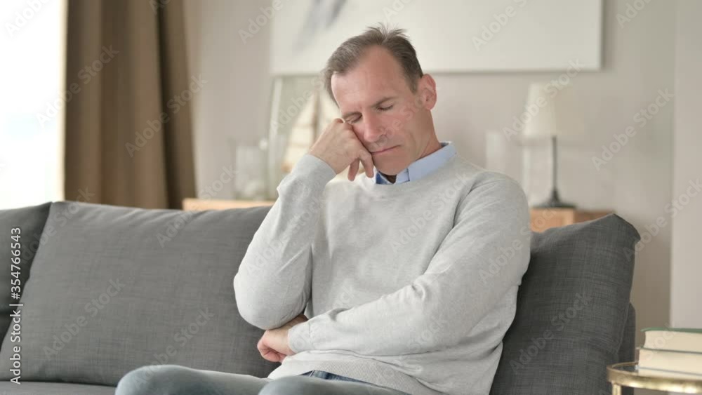 Exhausted Middle Aged Businessman having Nap on Sofa Exhausted Middle Aged Businessman having Nap on Sofa