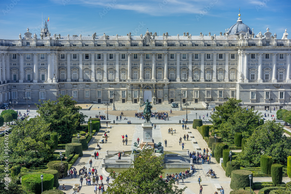 Prince's Gate of Royal Palace (Palacio Real) and Monument to Philip IV in Plaza de Oriente Square. Madrid, Spain. 