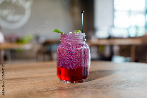 Rose syrup water with selasih or basil seed photo