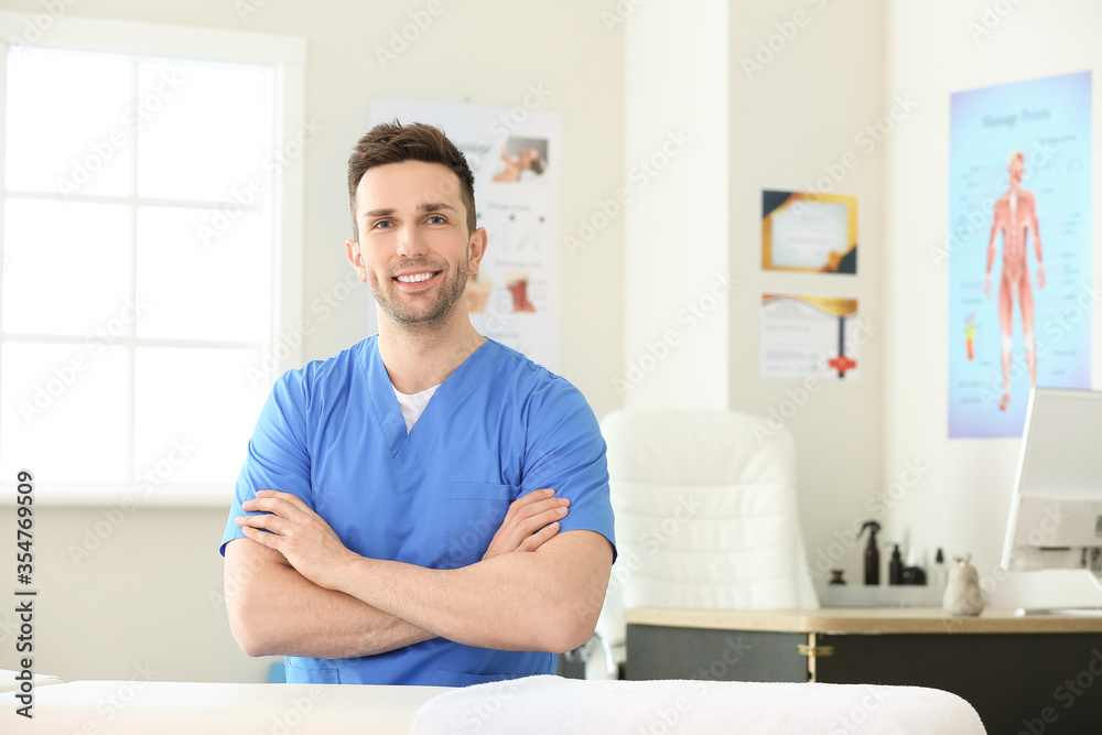 Fototapeta premium Portrait of massage therapist in medical center