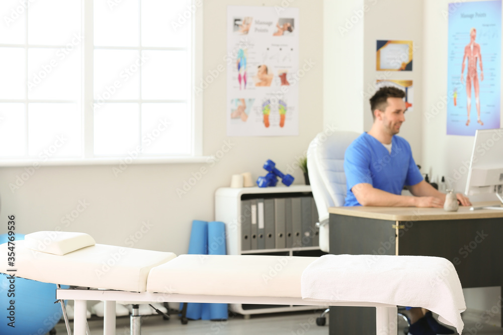 Office of massage therapist in modern medical center Office of massage therapist in modern medical center