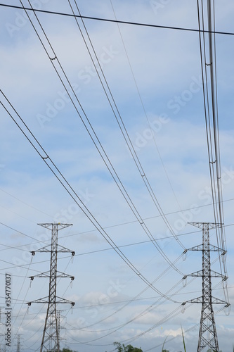 High voltage power lines across the sky.