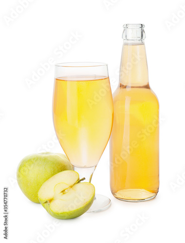 Bottle and glass of apple cider on white background