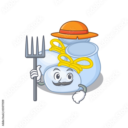 Baby boy boots mascot design working as a Farmer wearing a hat photo