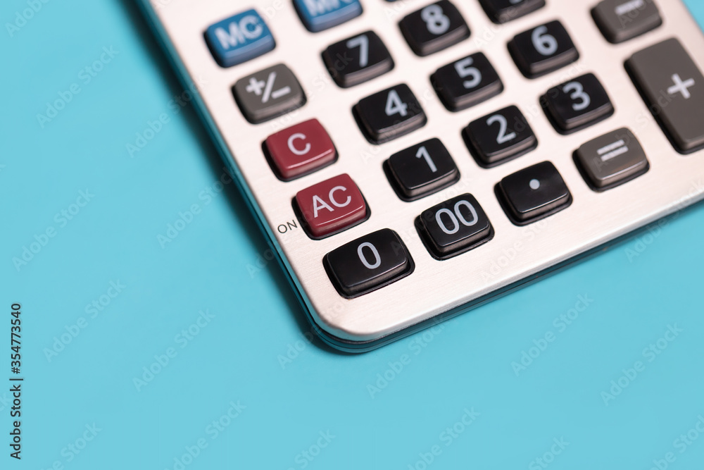 calculator and stationery items on the table for financial activity calculator and stationery items on the table for financial activity