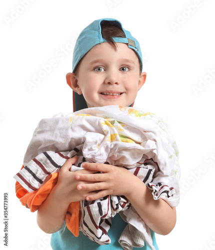 Little boy with laundry on ...