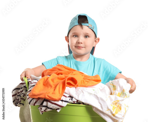 Little boy with laundry on ...