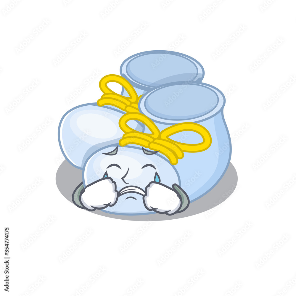 Caricature design of baby boy boots having a sad face Caricature design of baby boy boots having a sad face