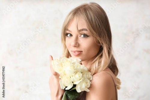 Beautiful young woman with ...