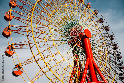 Vintage Ferris Wheel on Blue Sky