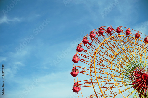 Vintage Ferris Wheel on Blue Sky