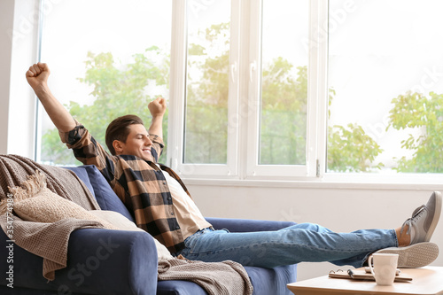 Lazy man spending day off a...