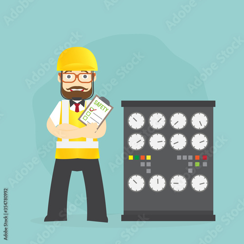 Man Safety inspector hold board checklist of industrial plants Standing inspection in front of the machine in the factory or workplace for safety first concept