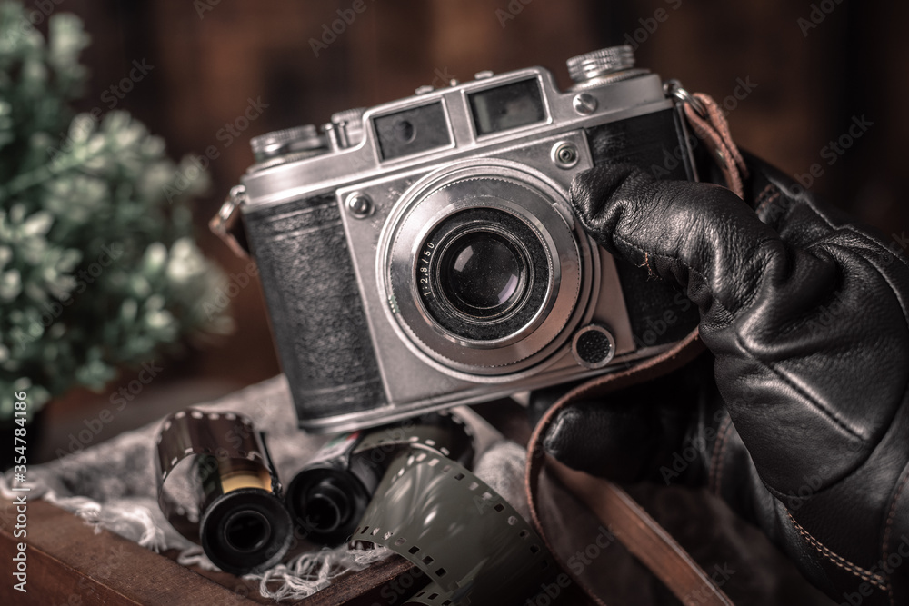 vintage camera in photographer's hand