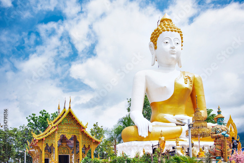 The White Big Buddha Statue and Golden Chapel of Wat Phra That Doi Kham Temple, One of Most famous tourist destination in Chiang Mai, Thailand