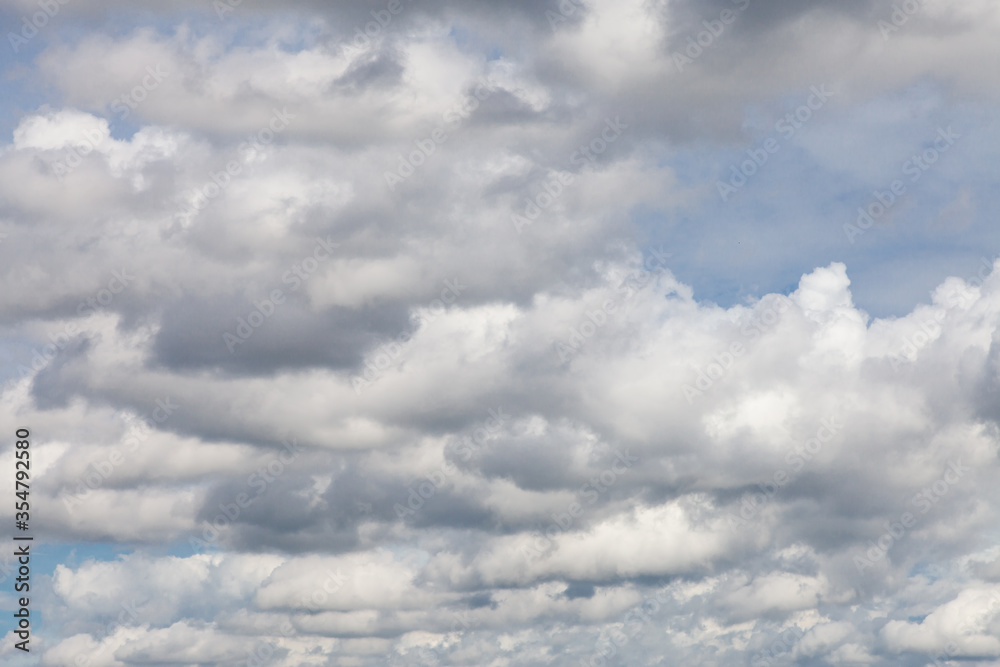 Fototapeta premium Blue sky background with clouds.