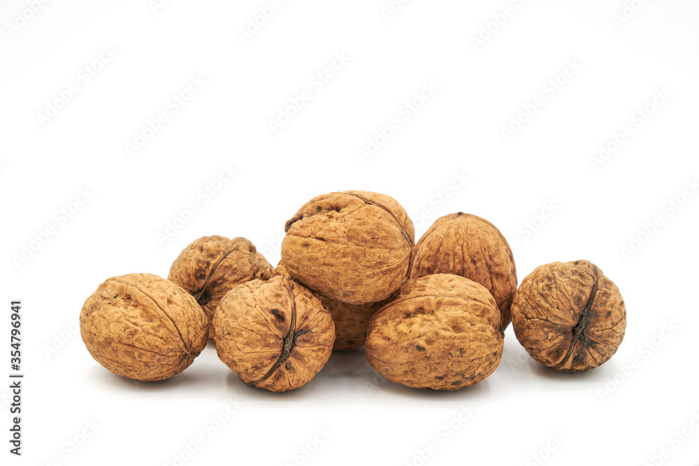 dried walnuts isolated on white background . dried walnuts isolated on white background .