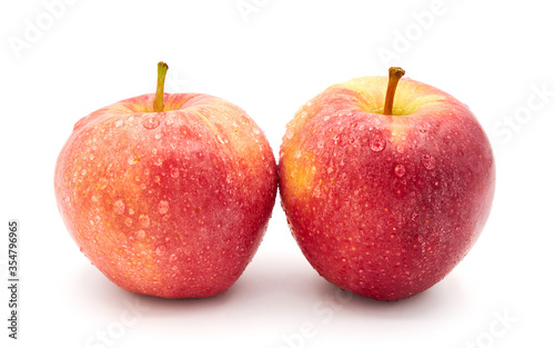 Two red apples isolated on white background . 