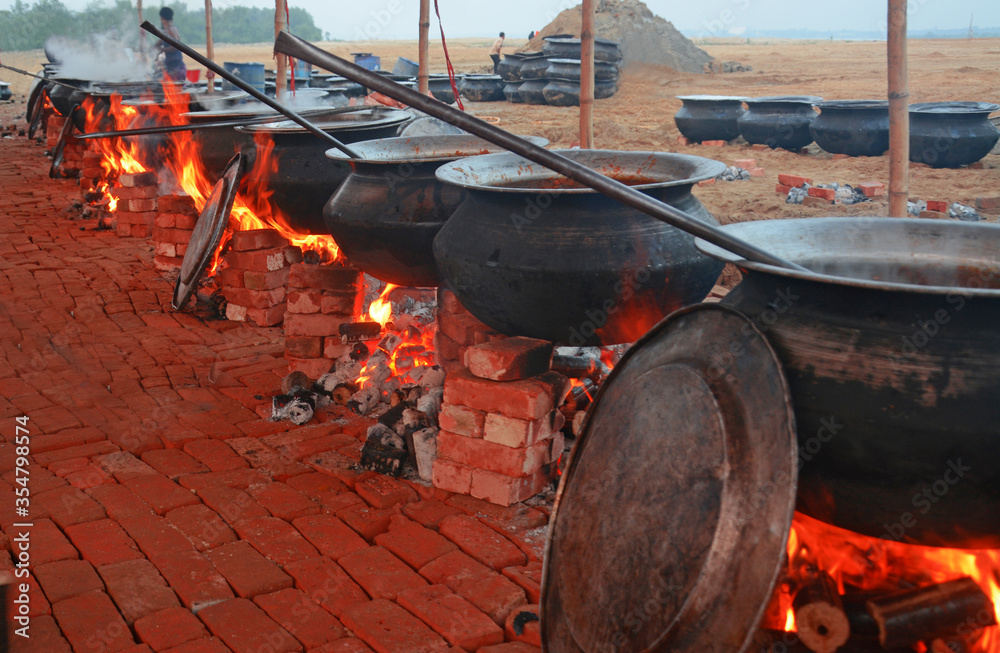 Mezban is a traditional food in chittagong,Bangladesh.Mezbani meat made