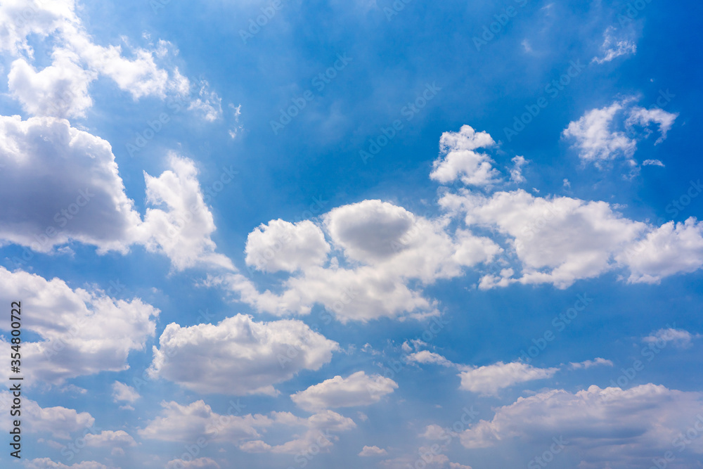 White clouds cumulus floating on blue sky in beautiful weather White clouds cumulus floating on blue sky in beautiful weather