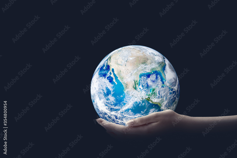 Ecology Concept : Hand holding blue planet earth in dark room. (Elements of this image furnished by NASA.) Ecology Concept : Hand holding blue planet earth in dark room. (Elements of this image furnished by NASA.)
