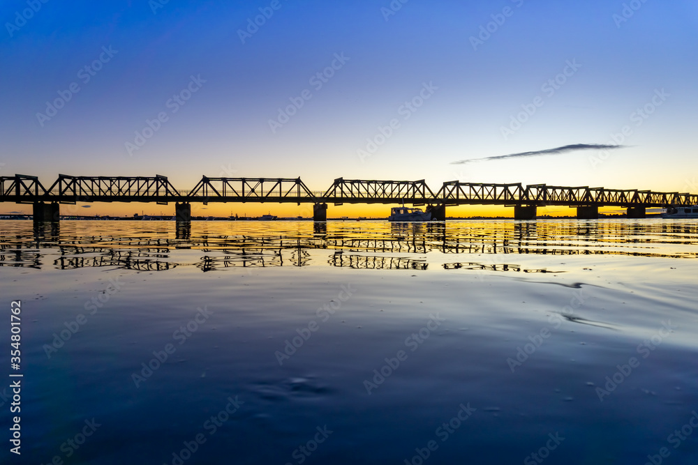 Fototapeta premium Tauranga historic Railway Bridge is a steel truss bridge crossing the harbour from city downtown to Matapihi peninsula.
