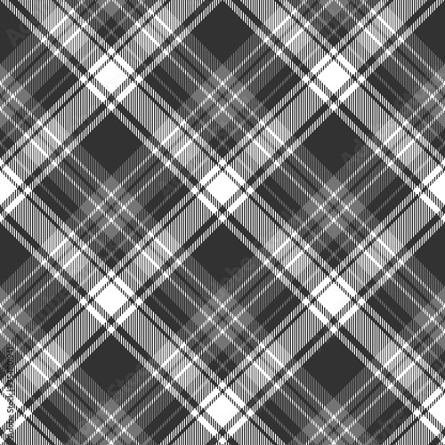 Plaid pattern vector in grey and white. Seamless Scottish tartan check plaid for flannel shirt  blanket  throw  duvet cover  or other modern autumn winter everyday fabric design.