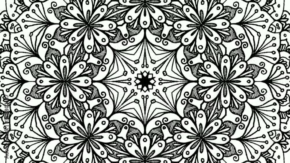 Close up of rotating computerized motion graphics of black and white, floral, symmetrical and circular mandala designs. Animation. Close up of rotating computerized motion graphics of black and white, floral, symmetrical and circular mandala designs. Animation.
