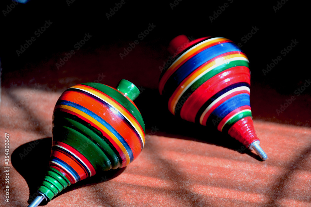 Trompo de madera, juguete mexicano. Stock Photo | Adobe Stock