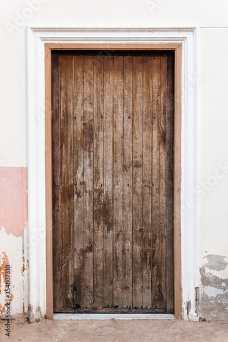 An old closed wooden door