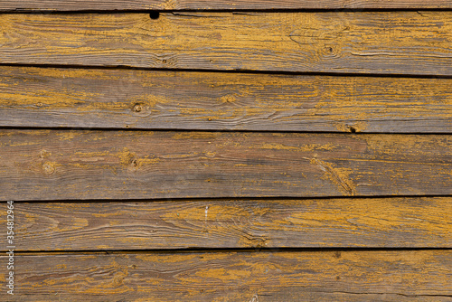 Obraz na płótnie Texture of a yellow fence made of wooden boards w salonie