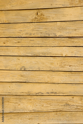 Obraz na płótnie Texture of a yellow fence made of wooden boards w salonie