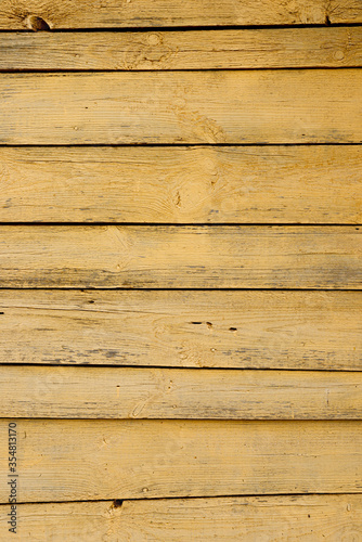 Obraz na płótnie Texture of a yellow fence made of wooden boards w salonie