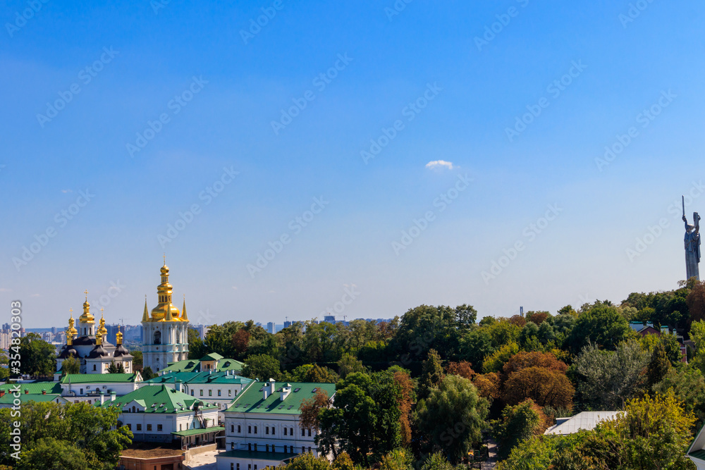 View of Kiev Pechersk Lavra (Kiev Monastery of the Caves) and Motherland Monument in Ukraine