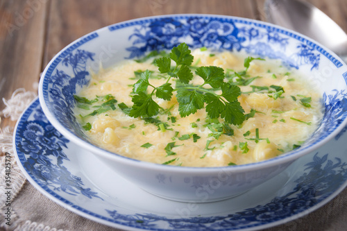 Homemade cheese soup with pasta