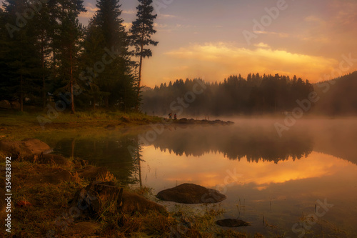 Mystical light in the early morning. Photographed at a small lake in Bulgaria.