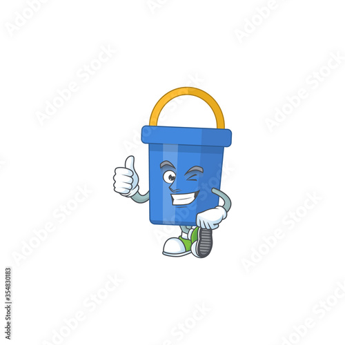 Caricature picture of blue sand bucket with Thumbs up finger