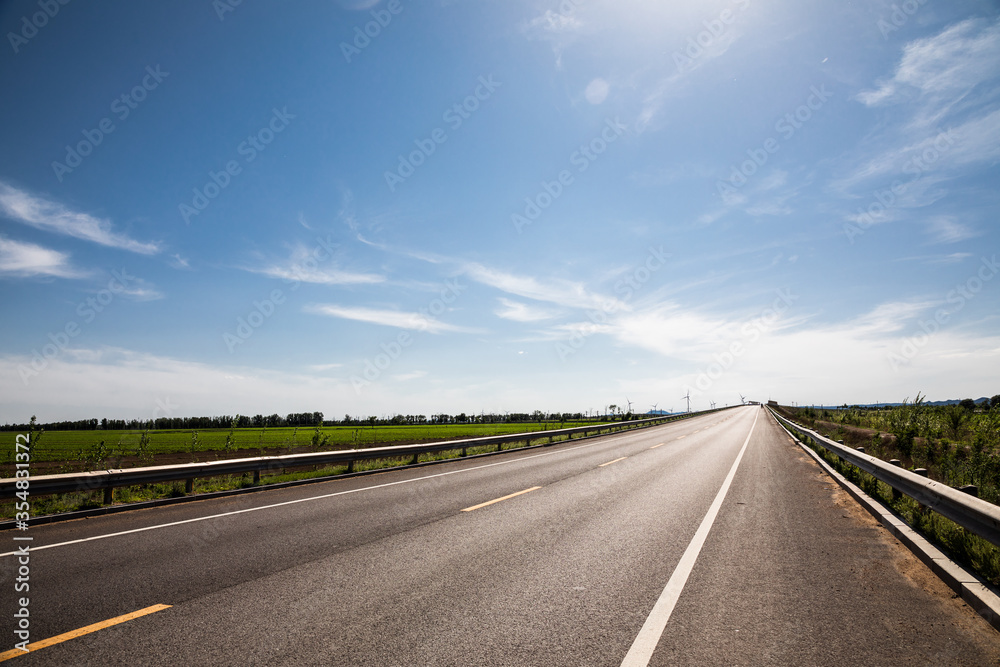 Picturesque country road and clear sky