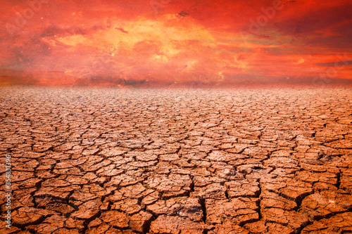 Land with the dry and cracked ground. Desert, Global warming background,. Elements of this image furnished by NASA