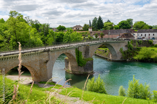 Ancient bridge over the river Gave d`Oloron at town of Navarrenx, France. © Philipimage