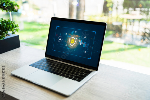 Laptop Computer with Data protection, Cyber security, information safety and encryption concept. internet technology and business concept, Mockup with copy space.