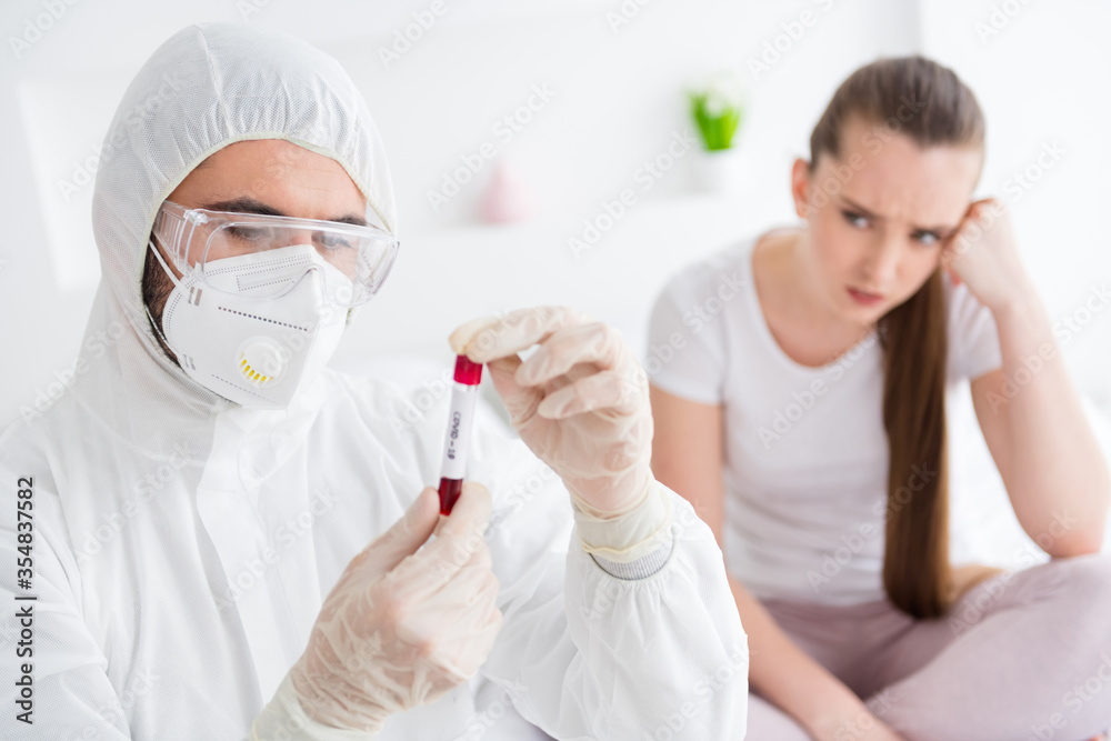 Photo of sick patient student lady unwell call emergency doc virologist collected blood probe flask flu cold covid symptom check tube wear mask gloves protective uniform bedroom indoors Photo of sick patient student lady unwell call emergency doc virologist collected blood probe flask flu cold covid symptom check tube wear mask gloves protective uniform bedroom indoors