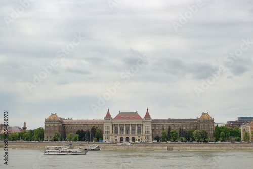 Landscape view of city Budapest, Hungary on the Dunabe river during cloudy and rainy day photo