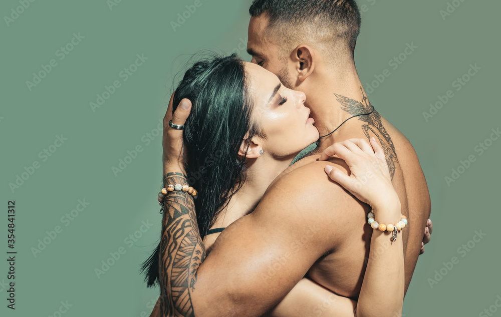 Couple in love. Beautiful couple embracing each other. Young lovers. Portrait of sexy beautiful couple. Sensual young people in love. Half naked young couple is making love, tender and romantic. Couple in love. Beautiful couple embracing each other. Young lovers. Portrait of sexy beautiful couple. Sensual young people in love. Half naked young couple is making love, tender and romantic.