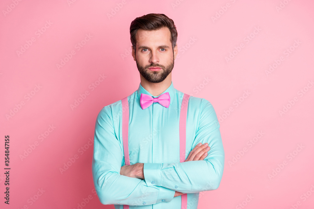 Close-up portrait of his he nice attractive content imposing calm serious bearded guy artist gentleman walking blue teal shirt folded arms isolated over pink pastel color background Close-up portrait of his he nice attractive content imposing calm serious bearded guy artist gentleman walking blue teal shirt folded arms isolated over pink pastel color background