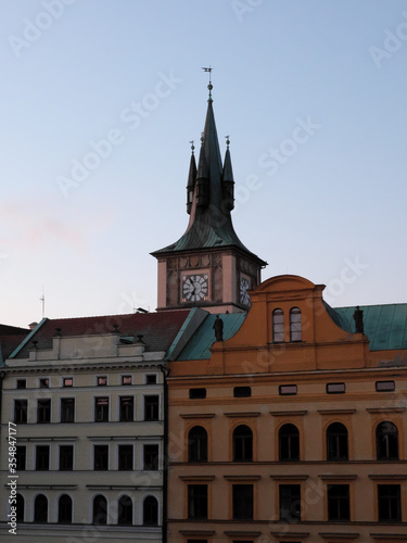 Old Prague clock tower. Picturesque European houses.
